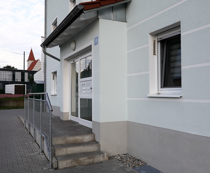 Multi-family housing estate with soffit ventilators