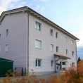 Multi-family housing estate with soffit ventilators