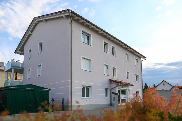 Multi-family housing estate with soffit ventilators