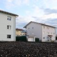 Multi-family housing estate with soffit ventilators